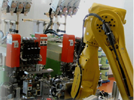 Parts transport system using a multiaxis robot
